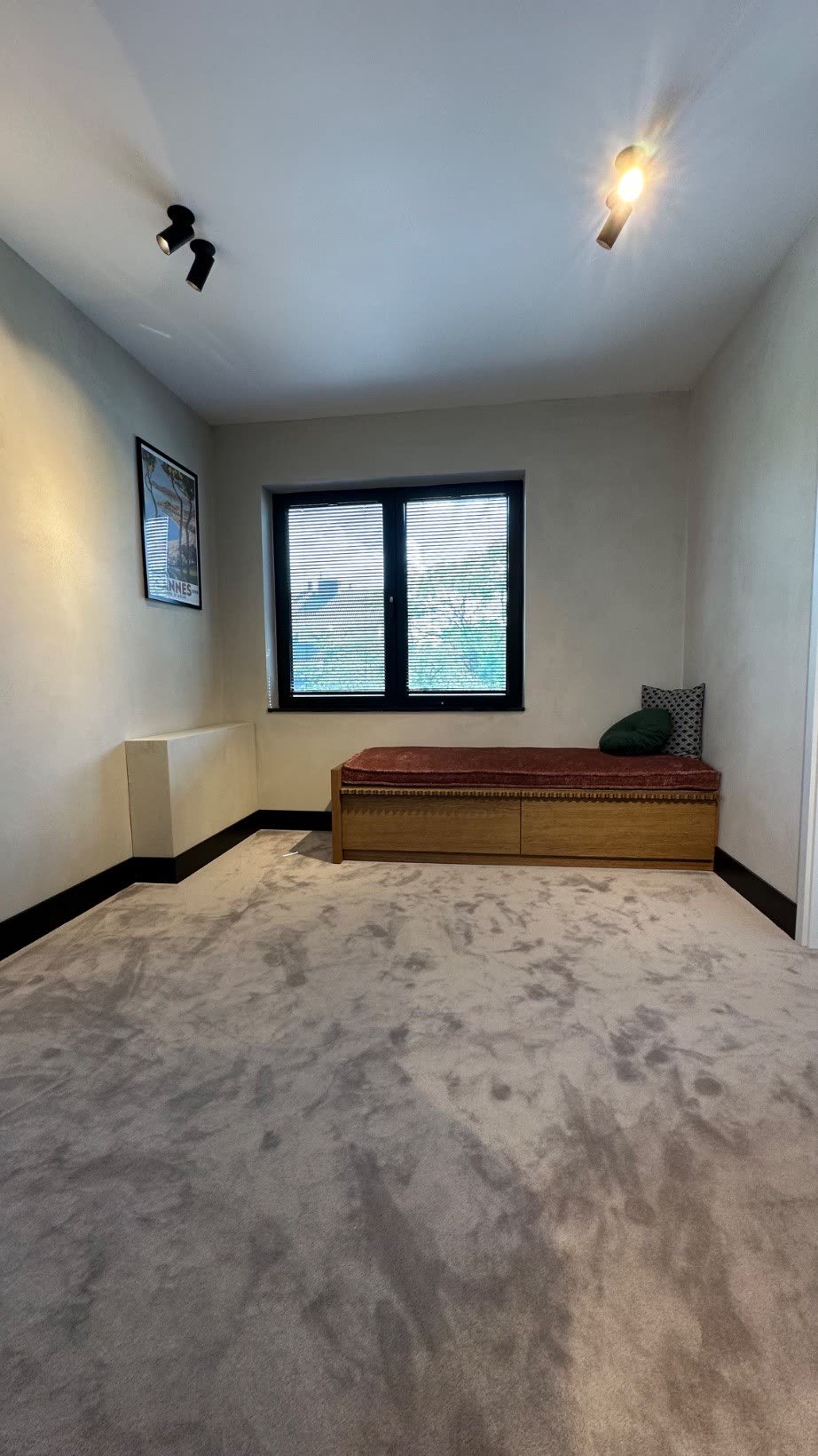 Bedroom with a bespoke oak bench beneath the window