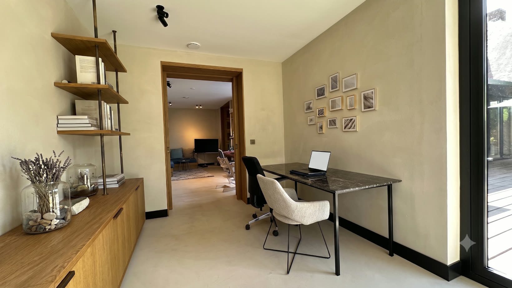 Office with stone desk and oak shelving